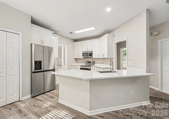 Photo 4 of Single family home for sale at 7731 Beaker Ct, Charlotte, NC 28269 | MLS# 4410357 | Listing updated on 2026-08-13