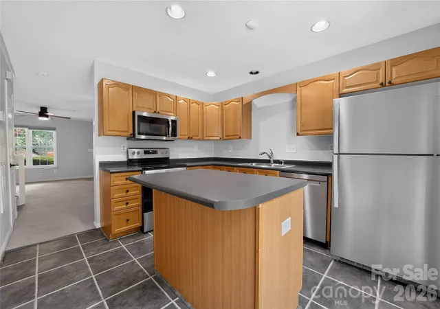 Photo 3 of Townhouse for sale at 9357 Glenwater Dr, Charlotte, NC 28262 | MLS# 4410481 | Listing updated on 2026-09-21