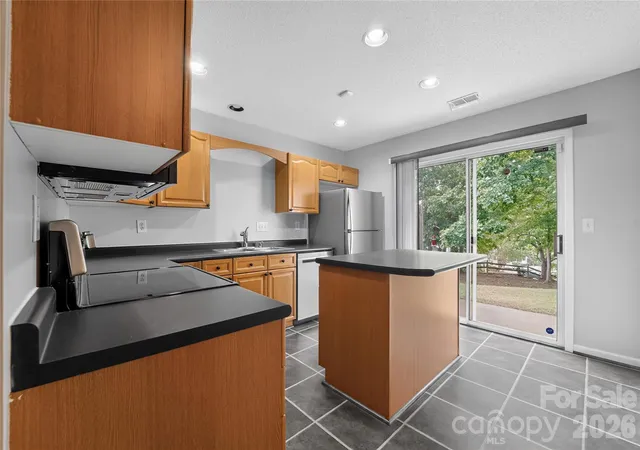 Photo 4 of Townhouse for sale at 9357 Glenwater Dr, Charlotte, NC 28262 | MLS# 4410481 | Listing updated on 2026-09-21