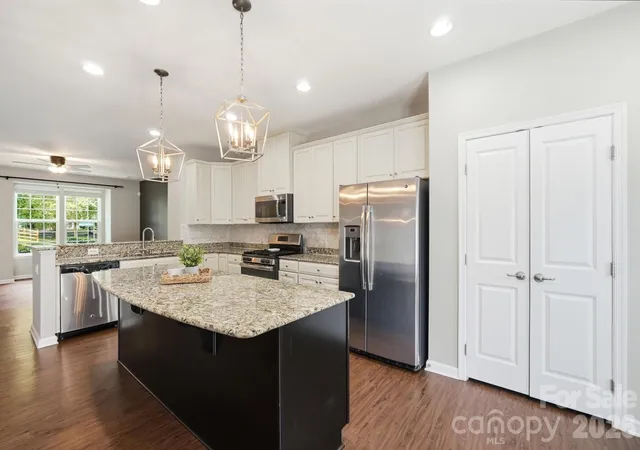 Photo 1 of Townhouse for sale at 6564 Hasley Woods Dr, Huntersville, NC 28078 | MLS# 4410992 | Listing updated on 2026-10-09