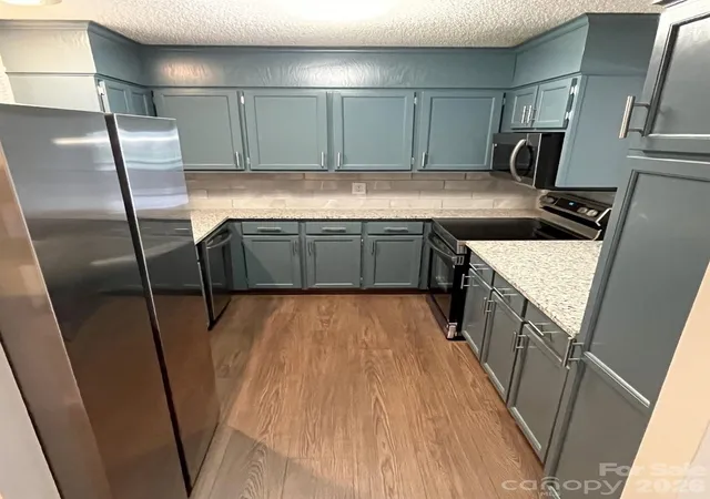 Photo 4 of Condo for sale at 9041 J M Keynes Dr #6, Charlotte, NC 28262 | MLS# 4411303 | Listing updated on 2026-10-21