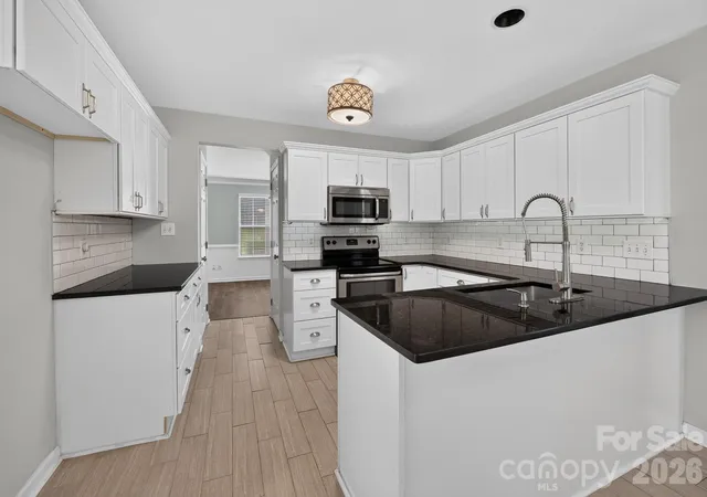 Photo 2 of Single family home for sale at 6420 Spanish Moss Ln, Charlotte, NC 28262 | MLS# 4411608 | Listing updated on 2026-08-07