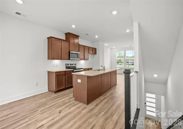 Photo 3 of Townhouse for sale at 1013 Revival Row, Charlotte, NC 28208 | MLS# 4411714 | Listing updated on 2026-10-09