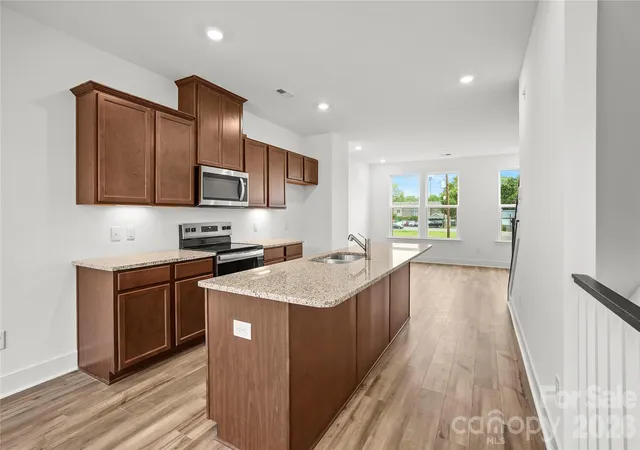 Photo 4 of Townhouse for sale at 1013 Revival Row, Charlotte, NC 28208 | MLS# 4411714 | Listing updated on 2026-10-09
