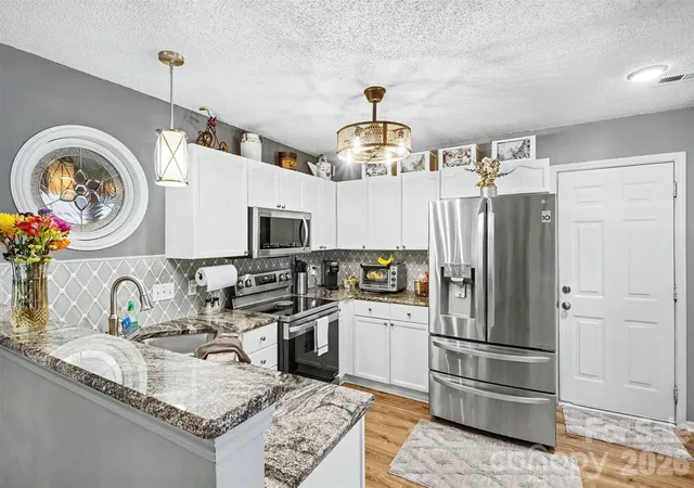 Photo 3 of Single family home for sale at 4828 Asherton Pl Nw, Concord, NC 28027 | MLS# 4411724 | Listing updated on 2026-09-04