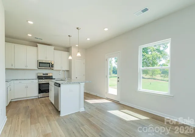 Photo 3 of Single family home for sale at 4243 Ruth Crk Ct, Charlotte, NC 28216 | MLS# 4412109 | Listing updated on 2026-10-07