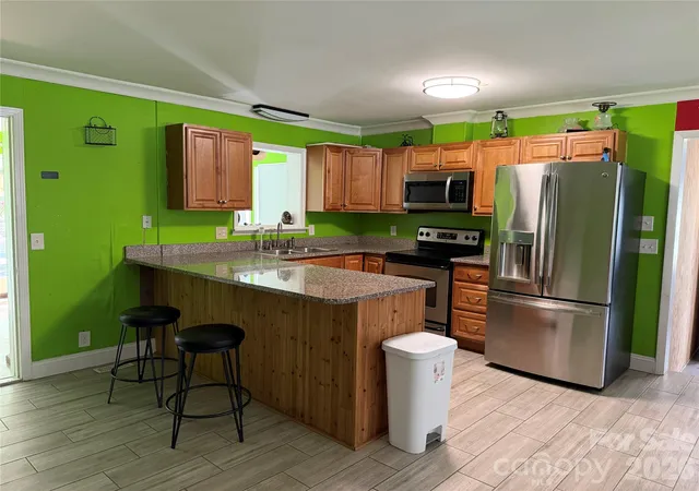 Photo 4 of Single family home for sale at 911 Eldorado Ave, Charlotte, NC 28262 | MLS# 4412351 | Listing updated on 2026-08-11