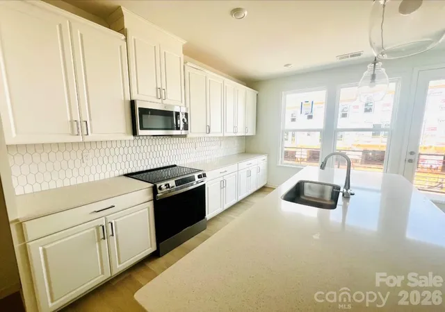 Photo 3 of Townhouse for sale at 1908 Alexander Village Main Dr, Charlotte, NC 28262 | MLS# 4413721 | Listing updated on 2026-10-01