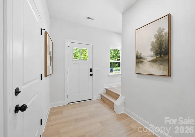 Photo 3 of Single family home for sale at 5016 Hoover Dr, Charlotte, NC 28269 | MLS# 4414075 | Listing updated on 2026-10-01