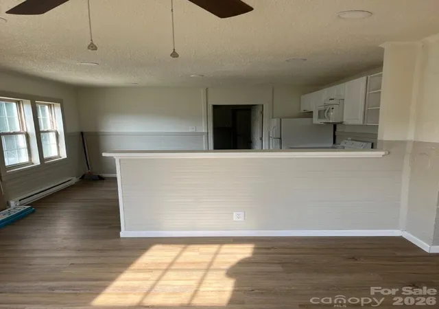 Photo 2 of Multi family home for sale at 723 Hunt St, Statesville, NC 28677 | MLS# 4414333 | Listing updated on 2026-08-21