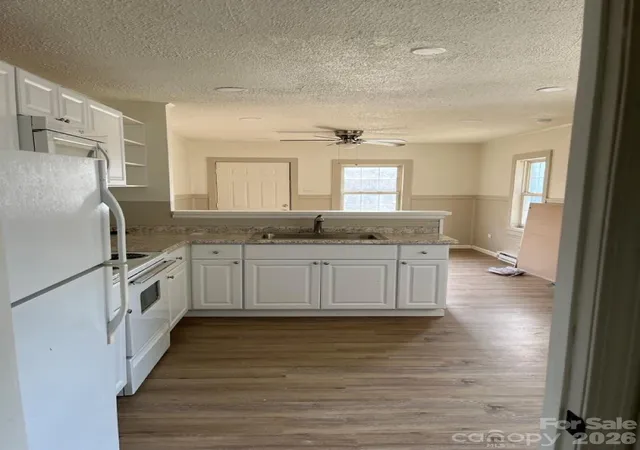 Photo 3 of Multi family home for sale at 723 Hunt St, Statesville, NC 28677 | MLS# 4414333 | Listing updated on 2026-08-21