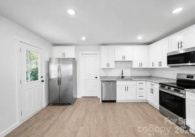 Photo 3 of Multi family home for sale at 1050 5th Street Ne, Hickory, NC 28601 | MLS# 4414436 | Listing updated on 2026-08-20