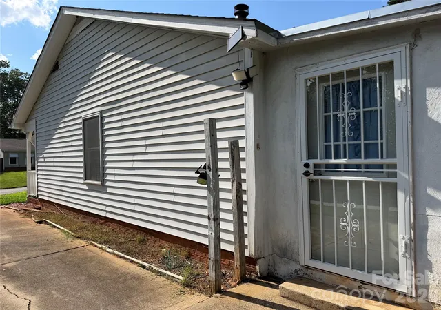Photo 3 of Single family home for sale at 5124 Poplar Springs Dr, Charlotte, NC 28269 | MLS# 4414665 | Listing updated on 2026-08-25