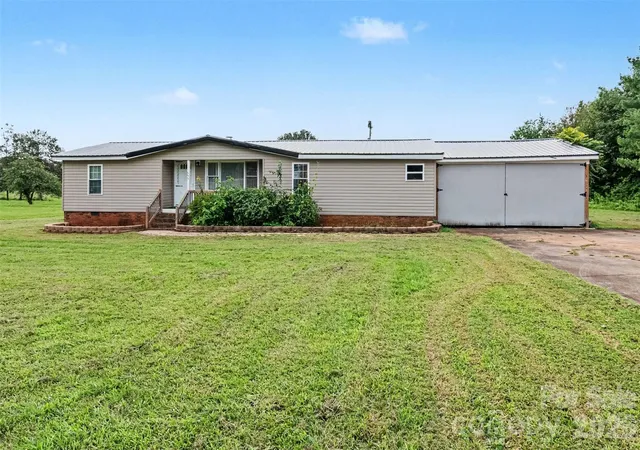Photo 1 of Single family home for sale at 599 Scotts Crk Rd, Statesville, NC 28625 | MLS# 4414968 | Listing updated on 2026-10-04