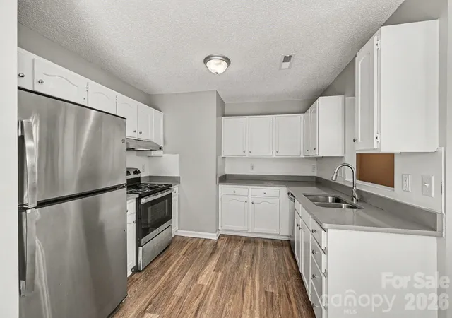Photo 4 of Single family home for sale at 302 Touch Me Not Ln, Charlotte, NC 28216 | MLS# 4415487 | Listing updated on 2026-08-21