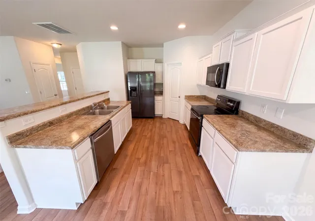 Photo 2 of Single family home for sale at 8815 First Run Ct, Charlotte, NC 28215 | MLS# 4417114 | Listing updated on 2026-10-08