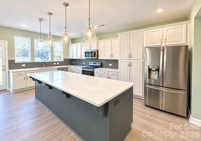 Photo 1 of Single family home for sale at 404 Babbling Brook Ln, Locust, NC 28097 | MLS# 4417275 | Listing updated on 2026-10-06