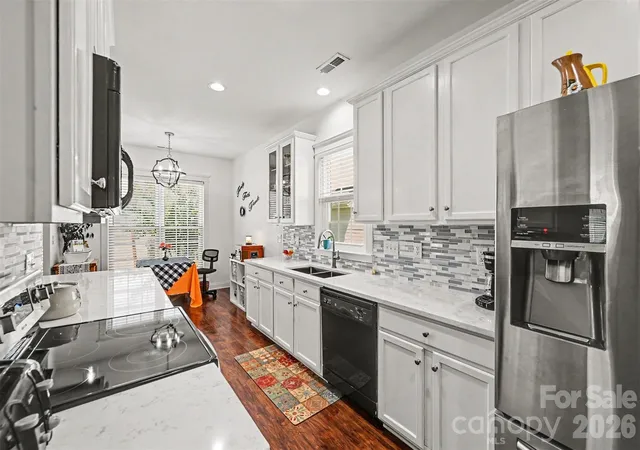 Photo 2 of Single family home for sale at 119 E Decatur Ave, Mooresville, NC 28117 | MLS# 4418043 | Listing updated on 2026-09-21