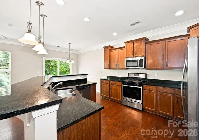 Photo 2 of Single family home for sale at 9320 Gentle Stream Ln, Charlotte, NC 28214 | MLS# 4418428 | Listing updated on 2026-09-24