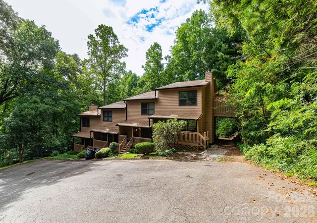 Photo 1 of Townhouse for sale at 404 Buck Cove Ter, Asheville, NC 28805 | MLS# 4418908 | Listing updated on 2026-10-15