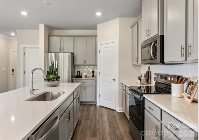 Photo 4 of Townhouse for sale at 8337 Hidden Springs Trl, Charlotte, NC 28216 | MLS# 4419246 | Listing updated on 2026-09-15