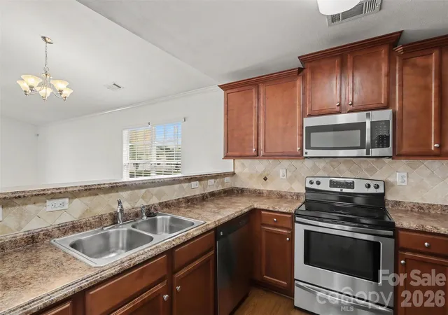 Photo 4 of Single family home for sale at 6009 Olivia Catherine Way, Charlotte, NC 28213 | MLS# 4419873 | Listing updated on 2026-09-30