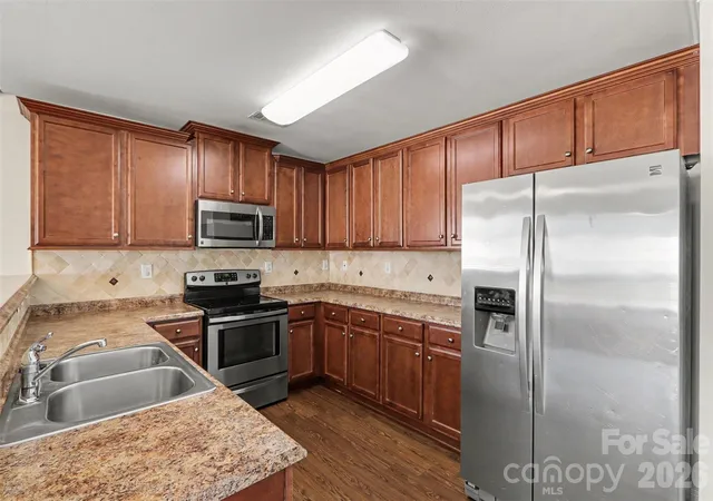 Photo 3 of Single family home for sale at 6009 Olivia Catherine Way, Charlotte, NC 28213 | MLS# 4419873 | Listing updated on 2026-09-30