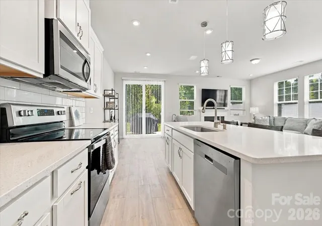 Photo 1 of Townhouse for sale at 8036 Overmeadow Ln, Charlotte, NC 28269 | MLS# 4419889 | Listing updated on 2026-10-07