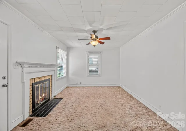 Photo 4 of Single family home for sale at 1127 Thompson Ave, Charlotte, NC 28216 | MLS# 4420178 | Listing updated on 2026-10-01