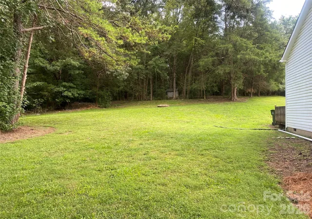 Photo 4 of Single family home for sale at 11101 Deerpath Ct, Charlotte, NC 28262 | MLS# 4420188 | Listing updated on 2026-09-21