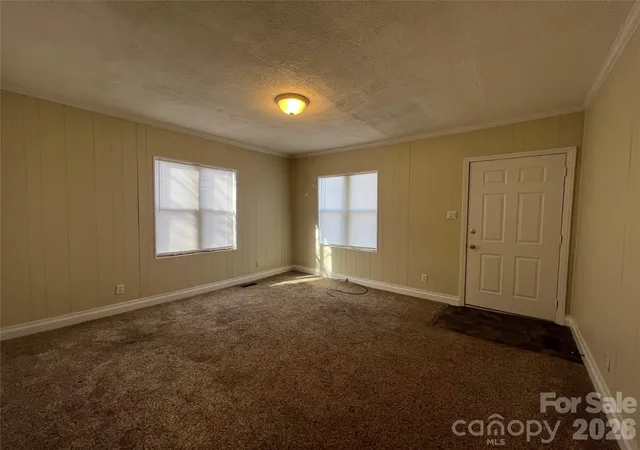 Photo 3 of Single family home for sale at 142 E Catawba Ave, Mount Holly, NC 28120 | MLS# 4420293 | Listing updated on 2026-09-05