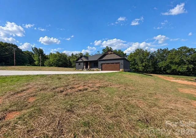 Photo 1 of Single family home for sale at 25011 Elias Trails Rd, Locust, NC 28097 | MLS# 4420599 | Listing updated on 2026-10-05