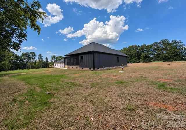 Photo 4 of Single family home for sale at 25011 Elias Trails Rd, Locust, NC 28097 | MLS# 4420599 | Listing updated on 2026-10-05