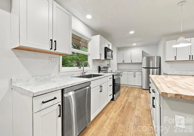 Photo 3 of Single family home for sale at 104 Disosway St, Black Mountain, NC 28711 | MLS# 4421418 | Listing updated on 2026-09-28
