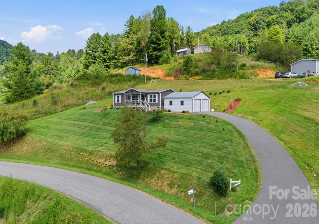 Photo 1 of Single family home for sale at 582 John Henry Rd, Burnsville, NC 28714 | MLS# 4421454 | Listing updated on 2026-09-07
