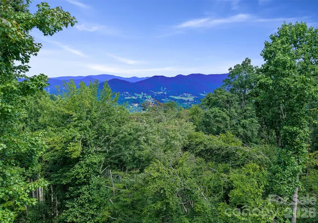 Photo 1 of Land for sale at 000 Winterberry Rd #25, Burnsville, NC 28714 | MLS# 4422784 | Listing updated on 2026-09-23