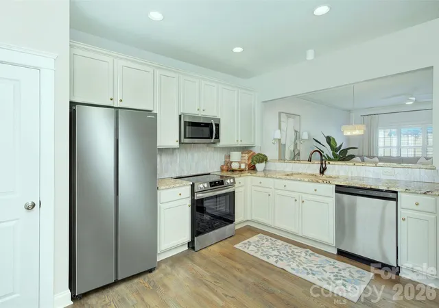Photo 2 of Townhouse for sale at 13612 Morehouse St, Huntersville, NC 28078 | MLS# 4423229 | Listing updated on 2026-09-15