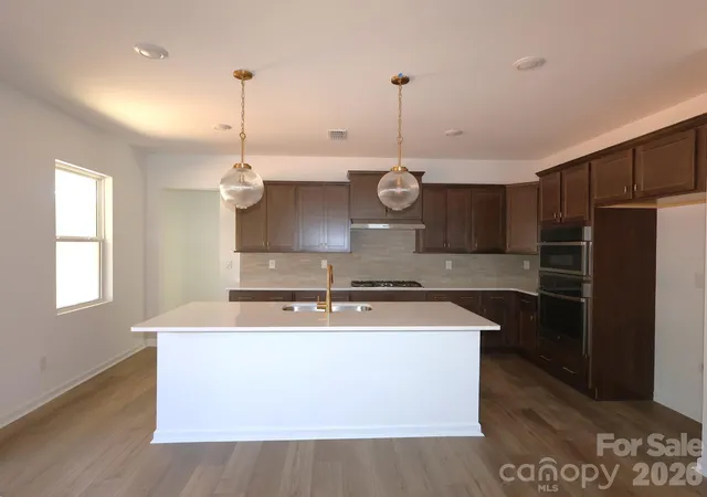 Photo 3 of Single family home for sale at 230 Amber Glen Dr, Locust, NC 28097 | MLS# 4423302 | Listing updated on 2026-09-30