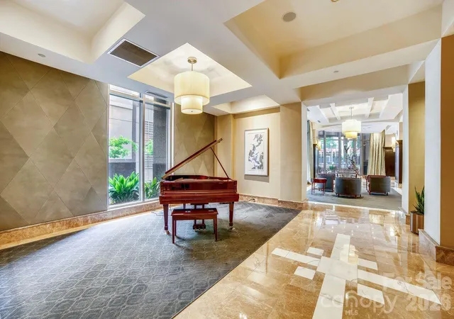 Listing Photo 3 - Condo for sale in building located at 230 S Tryon St, Charlotte, NC 28202 - Unit #511