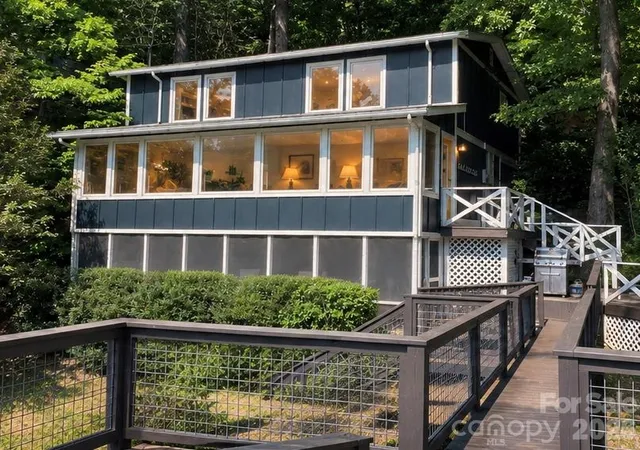 Photo 1 of Single family home for sale at 138 Hummingbird Cvs, Lake Lure, NC 28746 | MLS# 4423376 | Listing updated on 2026-10-05