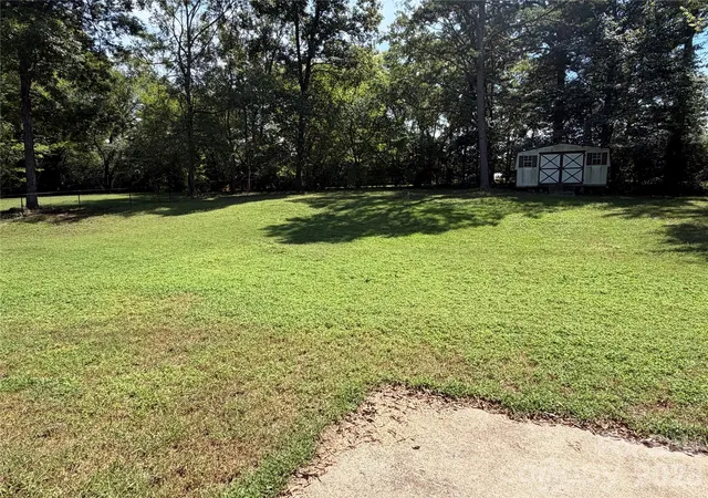 Photo 3 of Single family home for sale at 304 Plaza Dr, Harrisburg, NC 28075 | MLS# 4423605 | Listing updated on 2026-09-28