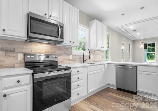 Photo 3 of Single family home for sale at 111 N Clay St, Lowell, NC 28098 | MLS# 4424138 | Listing updated on 2026-10-03