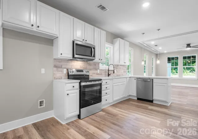 Photo 3 of Single family home for sale at 111 N Clay St, Lowell, NC 28098 | MLS# 4424138 | Listing updated on 2026-10-03