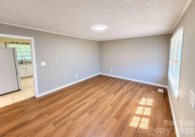 Photo 3 of Single family home for sale at 99 N Mcginnis Pl, Mount Holly, NC 28120 | MLS# 4424141 | Listing updated on 2026-10-01