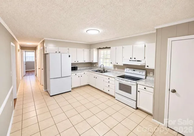 Photo 4 of Single family home for sale at 99 N Mcginnis Pl, Mount Holly, NC 28120 | MLS# 4424141 | Listing updated on 2026-10-01