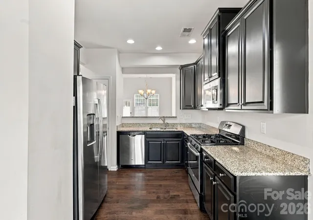 Photo 4 of Townhouse for sale at 9607 Springholm Dr, Charlotte, NC 28278 | MLS# 4424674 | Listing updated on 2026-09-23
