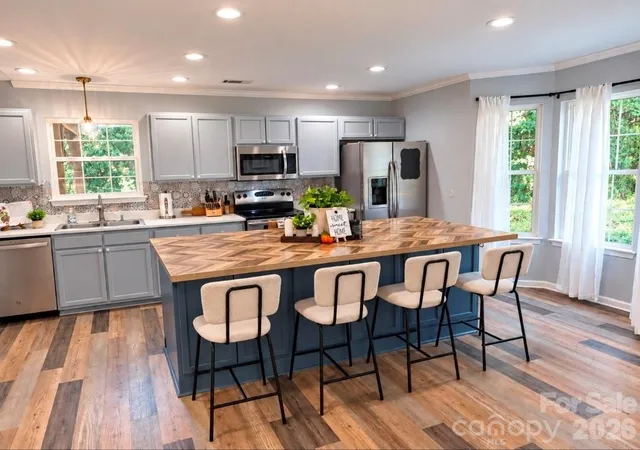 Photo 4 of Single family home for sale at 107 E Panther Crk Rd, Troutman, NC 28166 | MLS# 4424898 | Listing updated on 2026-09-19
