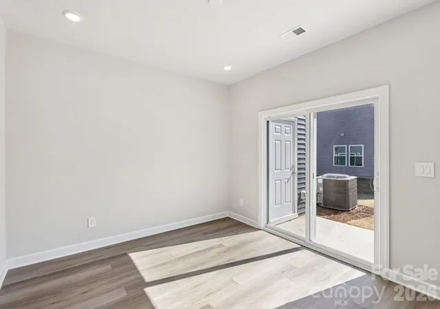Photo 3 of Townhouse for sale at 8017 Hidden Springs Trl, Charlotte, NC 28216 | MLS# 4425495 | Listing updated on 2026-09-17