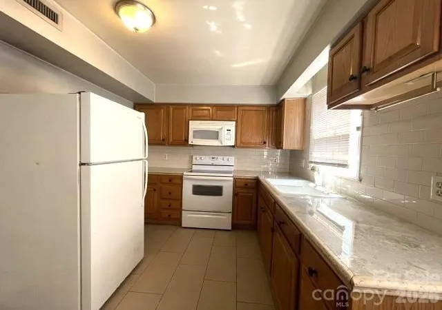 Listing Photo 1 - Condo for sale in building located at 6432 Old Pineville Rd, Charlotte, NC 28217 - Unit #E