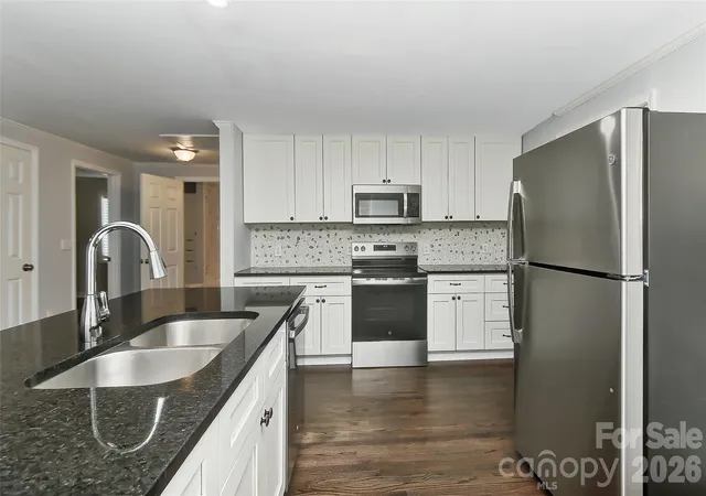 Photo 3 of Single family home for sale at 2941 Reid Ave, Charlotte, NC 28208 | MLS# 4425898 | Listing updated on 2026-09-21